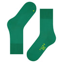 Paar Falke Run Sock 16605 sportsokken voor dames en heren in roestbruin, met geribde boorden en blauwe logodetails. - Jambelles