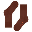 Paar Falke Run Sock 16605 sportsokken voor dames en heren in roestbruin, met geribde boorden en blauwe logodetails. - Jambelles