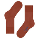 Paar Falke Run Sock 16605 sportsokken voor dames en heren in roestbruin, met geribde boorden en blauwe logodetails. - Jambelles