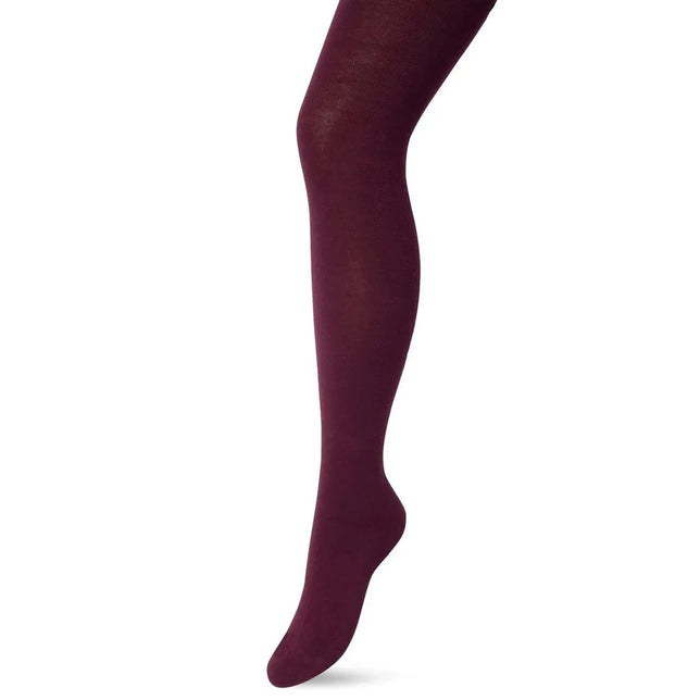 Bonnie Doon dames Bio Cotton maillot BP051900 in effen bordeauxrood, gedragen aan één been. - Jambelles