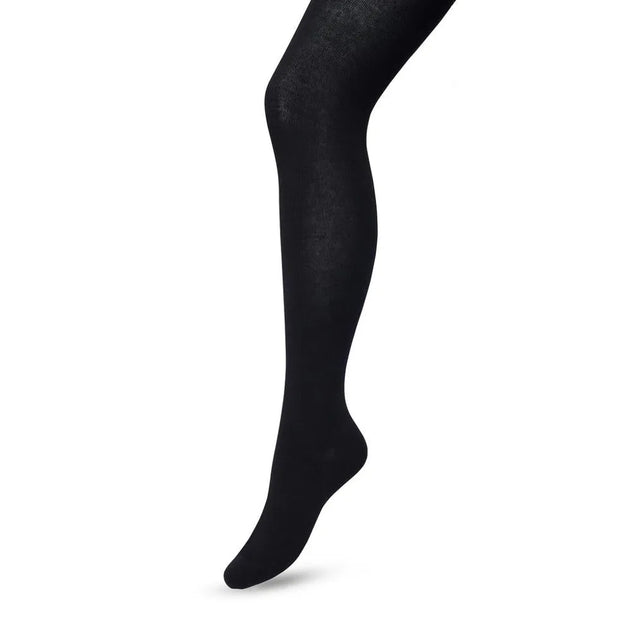 Bonnie Doon damesmaillot Bio Cotton Tights BP051900 in effen zwart, getoond aan een gebogen been. - Jambelles