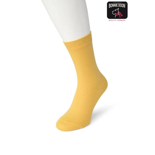 Bonnie Doon dames Bio Cotton Sock BP051100 in okergeel, effen uitgevoerd met een geribde boord. - Jambelles