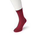 Zwarte Bonnie Doon dames Bio Cotton Sock BP051100, effen uitgevoerd en getoond aan een witte paspopvoet. - Jambelles