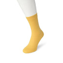 Zwarte Bonnie Doon dames Bio Cotton Sock BP051100, effen uitgevoerd en getoond aan een witte paspopvoet. - Jambelles