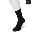 Zwarte Bonnie Doon dames Bio Cotton Sock BP051100, effen uitgevoerd en getoond aan een witte paspopvoet. - Jambelles