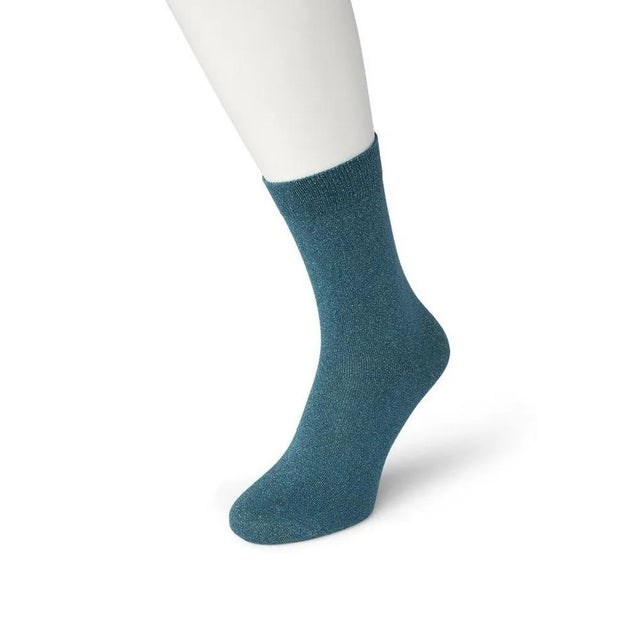Bonnie Doon Cotton Sparkle damessok in petrolblauw met fijne glitter, gedragen op een witte mannequinvoet. - Jambelles
