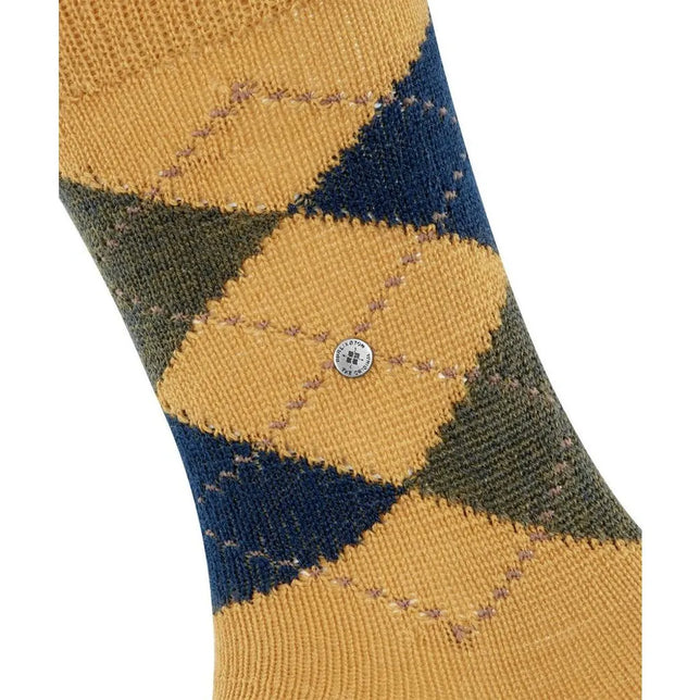 Burlington heren sok Preston SO 24284 in okergeel met marineblauw-groen ruitpatroon en rond merklogo. - Jambelles