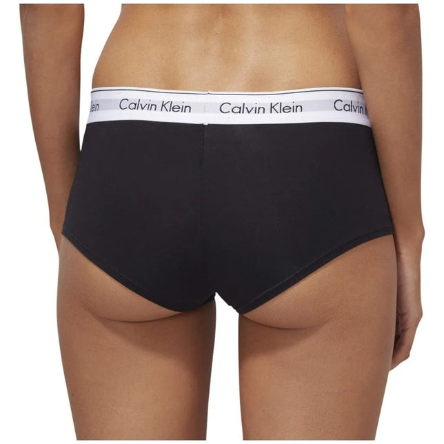 Calvin Klein dames boxer boy short in zwart, achteraanzicht met witte elastische logoband - Jambelles