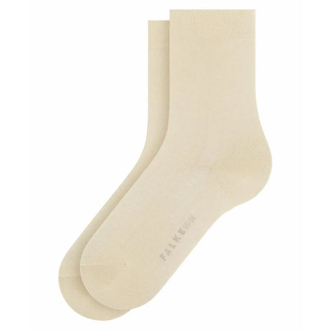Crèmekleurige FALKE Cotton Touch SO 47673 damessokken met effen ontwerp, geribde boord en logo onder de voet. - Jambelles