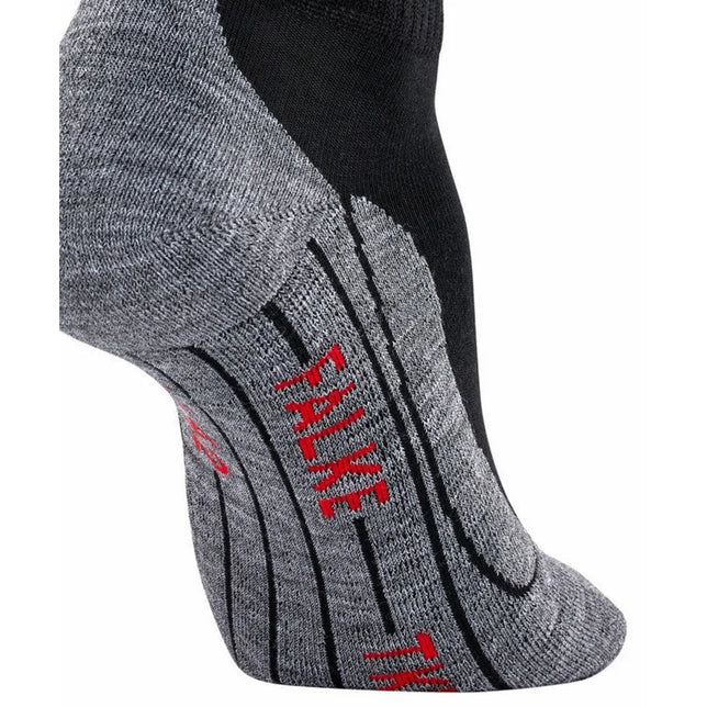 Grijze FALKE TK5 Sh W 16473 dameswandelsok met zwarte boord en strepen en rood FALKE-logo. - Jambelles