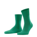 Paar Falke Run Sock 16605 sportsokken voor dames en heren in roestbruin, met geribde boorden en blauwe logodetails. - Jambelles