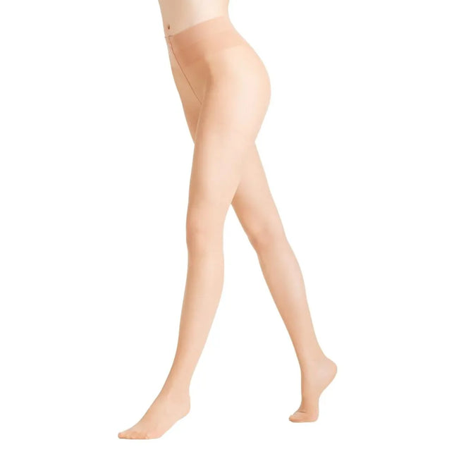 Falke Vitalize TI 20 40542 damespanty in huidkleur, transparant en glad met hoge taille, gedragen door een model. - Jambelles