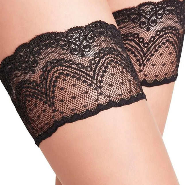 Falke Invisible Deluxe 8 stay-up kousen in huidkleur met brede zwarte kanten boord en bloemmotief. - Jambelles