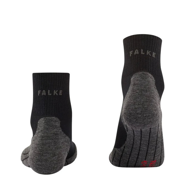 Paar FALKE TK5 Wool Short herensokken in zwart met grijze verstevigde zool, ribboord en logo. - Jambelles