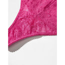 Model draagt de zwarte Lace Laboratory HWT high-waist string van transparant kant met geschulpte rand. - Jambelles
