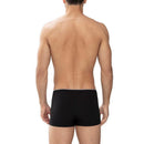 Model draagt de donkerblauwe Mey heren boxer shorty 46021 met korte pijpen en een gladde, aansluitende pasvorm. - Jambelles