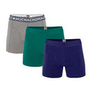 Model draagt een zwarte Muchachomalo herenboxer 1010SOLID met lange pijpen en elastische logoband. - Jambelles