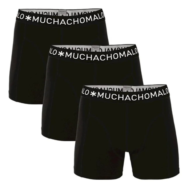 Drie zwarte Muchachomalo herenboxers met effen ontwerp en zwarte tailleband met wit merklogo. - Jambelles