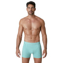 Model draagt zwarte Muchachomalo herenboxer uit 10-pack Solid U-Solid1010 met turquoise logoband. - Jambelles