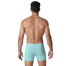 Model draagt zwarte Muchachomalo herenboxer uit 10-pack Solid U-Solid1010 met turquoise logoband. - Jambelles