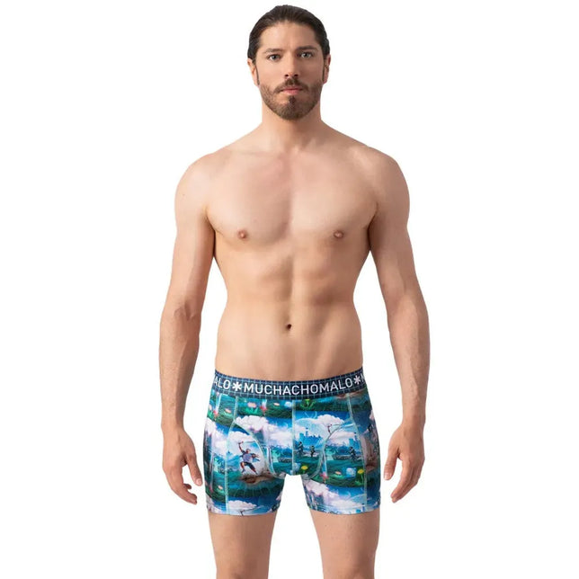 Muchachomalo herenboxer in blauw en groen met virtualrealityprint en zwarte logoband, gedragen door een model. - Jambelles