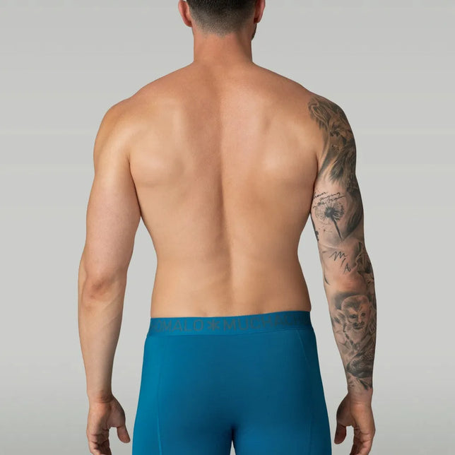 Muchachomalo herenboxer Solid Lcsolid1010 in petrolblauw, achteraanzicht met elastische logoband. - Jambelles