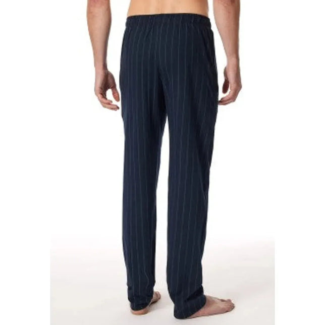 Schiesser herenbroek lang 182185 in donkerblauw met fijne verticale strepen en elastische taille, achteraanzicht. - Jambelles