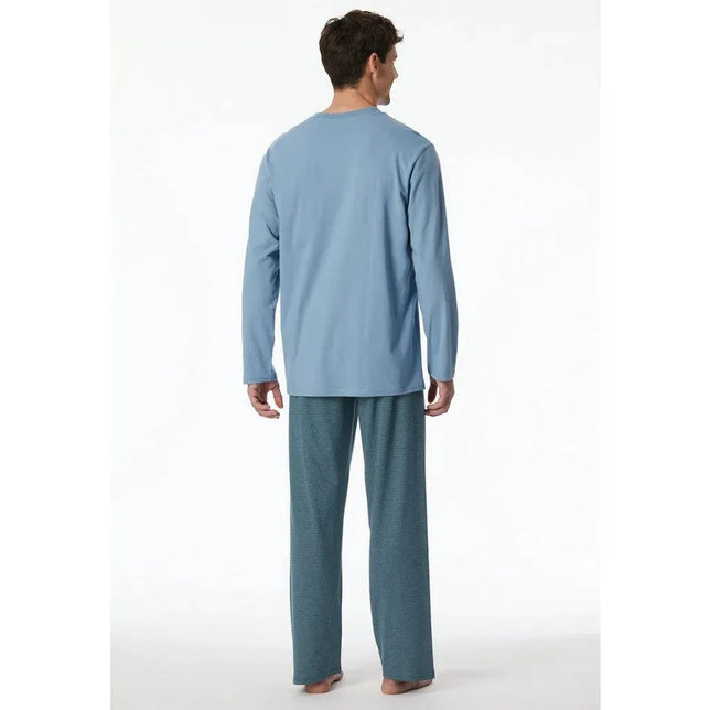Schiesser herenpyjama 181154 van achteren, met lichtblauw shirt met lange mouwen en donkerblauwe dessinbroek. - Jambelles