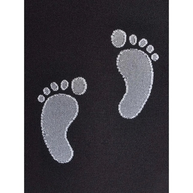 Wolford Maternity Treasure 66 dameslegging in zwart met twee witte ingebreide babyvoetafdrukken. - Jambelles