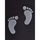 Detail van zwarte Wolford Maternity Treasure dameslegging met twee grijze babyvoetafdrukken. - Jambelles