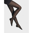 Wolford dames Maternity 30 panty in nude, gedragen door zwangere vrouw, met hoge buikband en witte voetafdrukken. - Jambelles